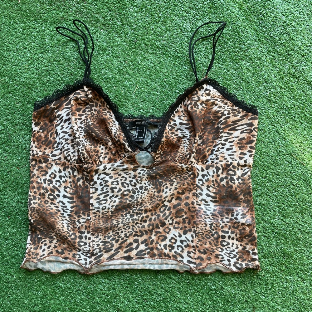 A mesh knit cami featuring an allover leopard print